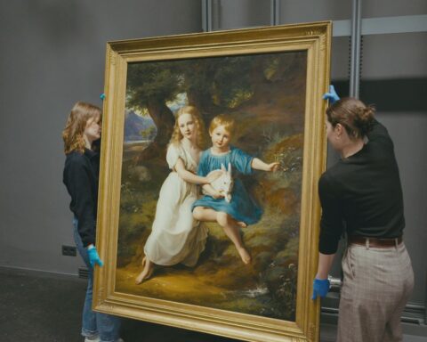 Painting titled Die Kinder Des Künstlers by Friedrich Wilhelm von Schadow, being carried in Dusseldorf gallery.