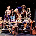 An archival photo of the cast of the Toronto 1972 production of Godspell on the stage.