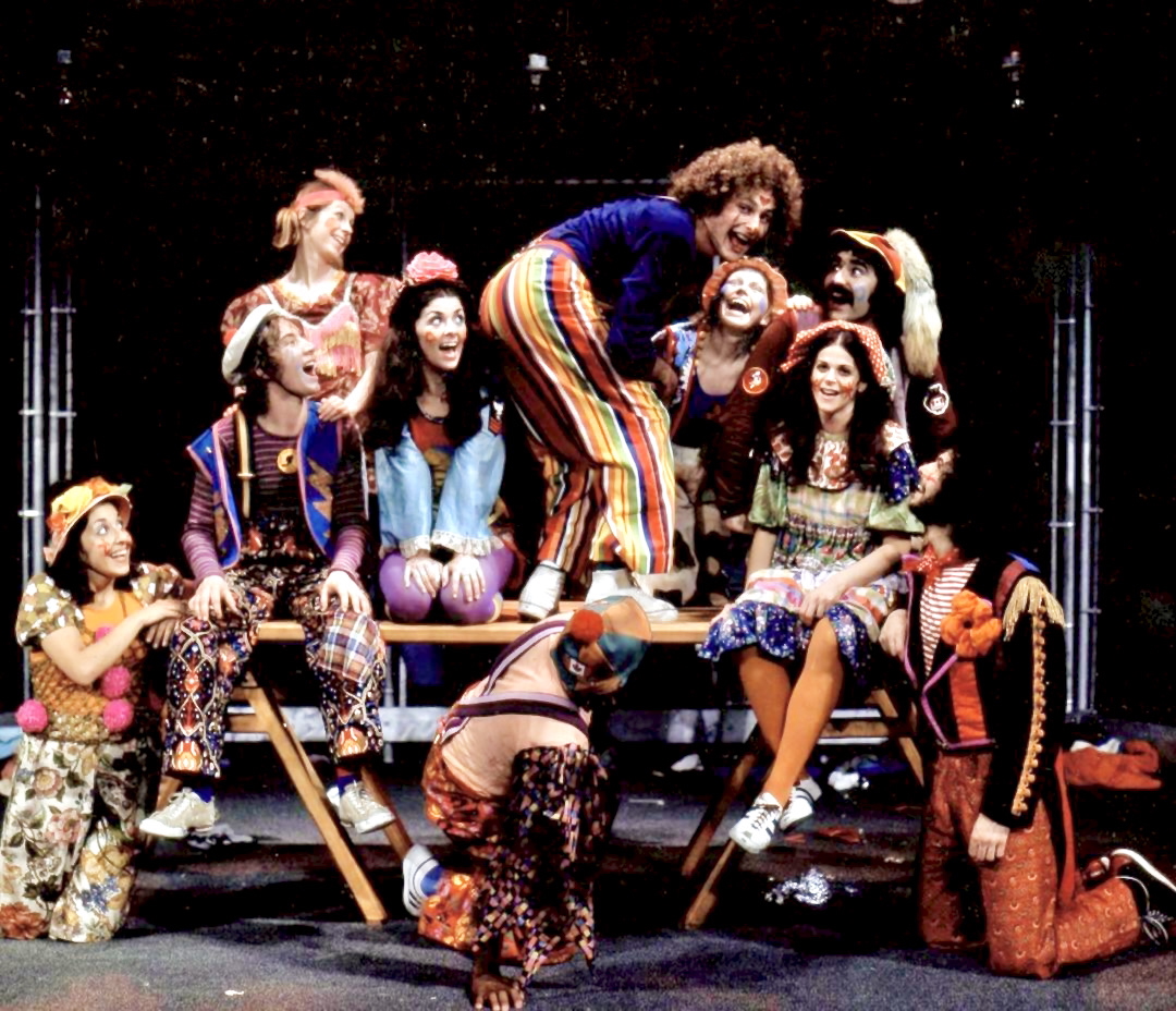 An archival photo of the cast of the Toronto 1972 production of Godspell on the stage.