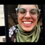 Palestinian journalist Fatma Hassouna appears on a video call on a phone.