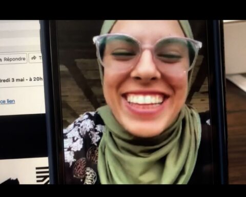Palestinian journalist Fatma Hassouna appears on a video call on a phone.