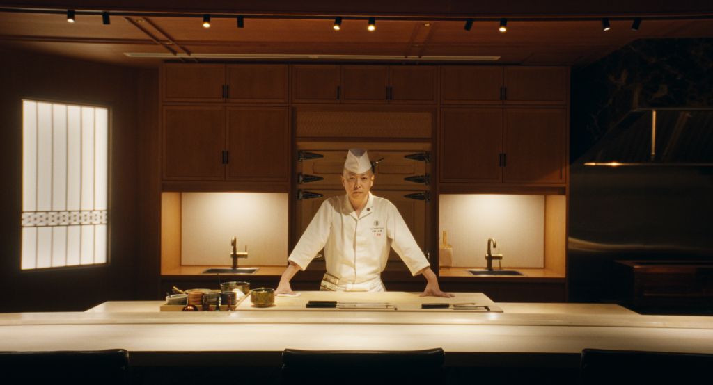 Chef Masaki Saito at his counter in his Yorkville restauarant