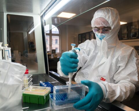 Evolutionary biologist Eske Willerslev working on DNA samples in his Wet Lab at the University of Copenhagen.