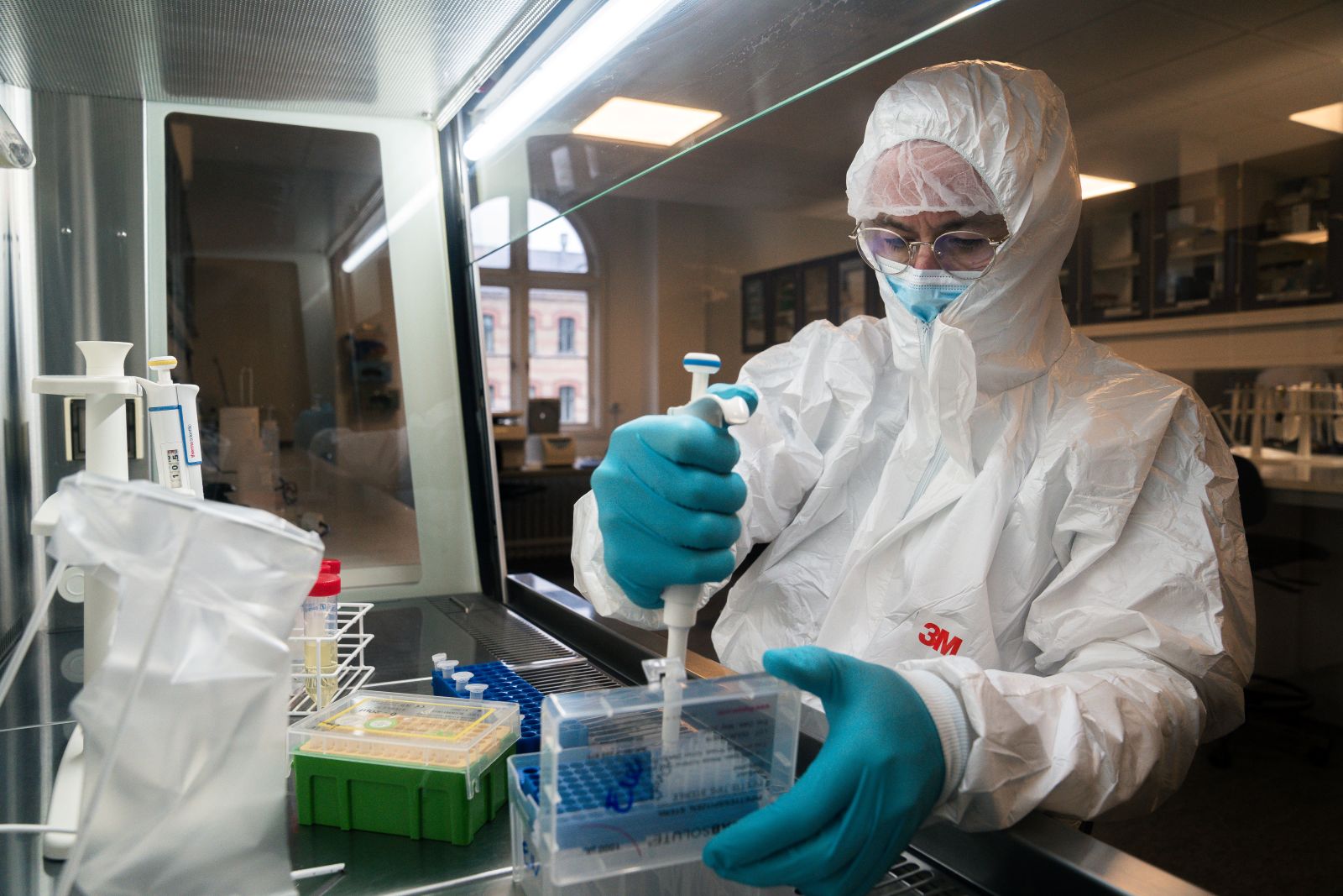 Evolutionary biologist Eske Willerslev working on DNA samples in his Wet Lab at the University of Copenhagen.