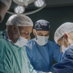 A team of doctors in an operating room.