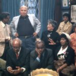 Sitting (left to right): Thomas Harvey, William Patterson, John Henrik Clarke, Mrs. J.B Matthews, Louise Patterson. Standing (left to right): Ernest Chrichlow, Romare Bearden, Ida Mae Cullen. Photo taken in 1972. Credit: Bruce Stanford. Courtesy: William Greaves Productions