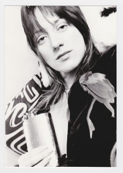 A black and white image of a young Carole Pope in 1974
