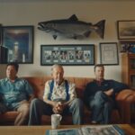 Richard, Mike, and Roger Gage at the Gage family home. Mike’s 61.5-pound Tyee hangs on the wall above them