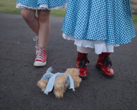 4. In the documentary It’s Dorothy!, young fans attend a screening of The Wizard of Oz in their blue gingham and red shoes. Photo credit: Austin Harris.