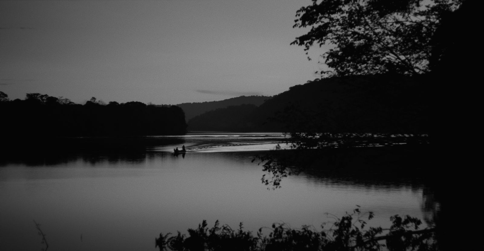 A black and white photo of the Lawa River in the Amazon region of South America.
