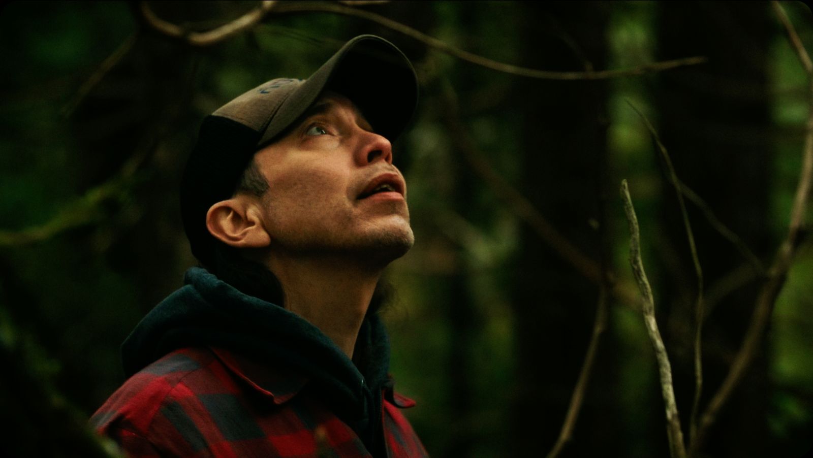 Qwaxw visits the gravesite at Nusq’lst Village, confronting the legacy of smallpox and dispossession that reshaped Nuxalkulmc (Nuxalk Territory).