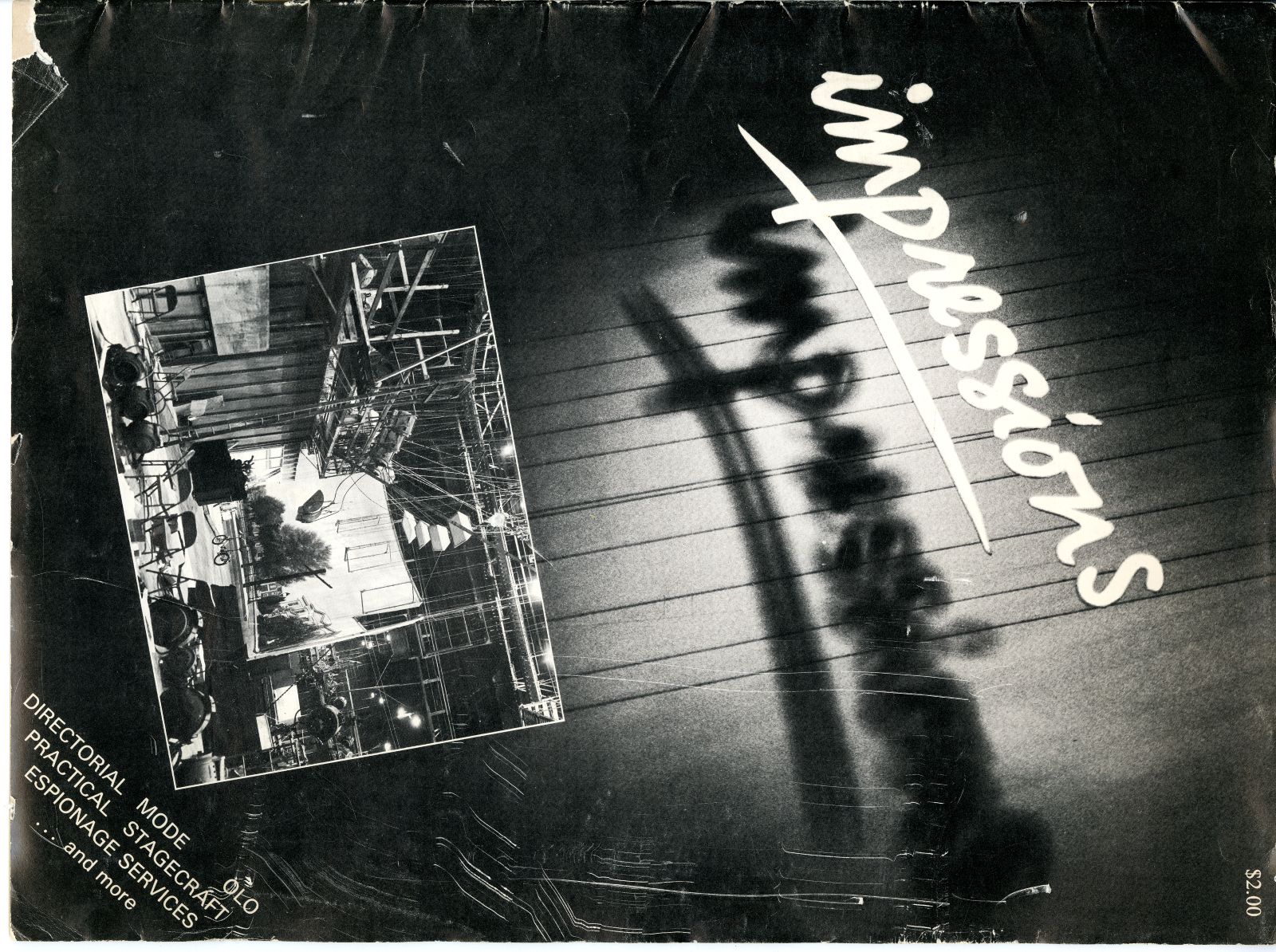 A cover of an old magazine displays a black and white image with the title 'Impressions' written in white text with a line underneath.