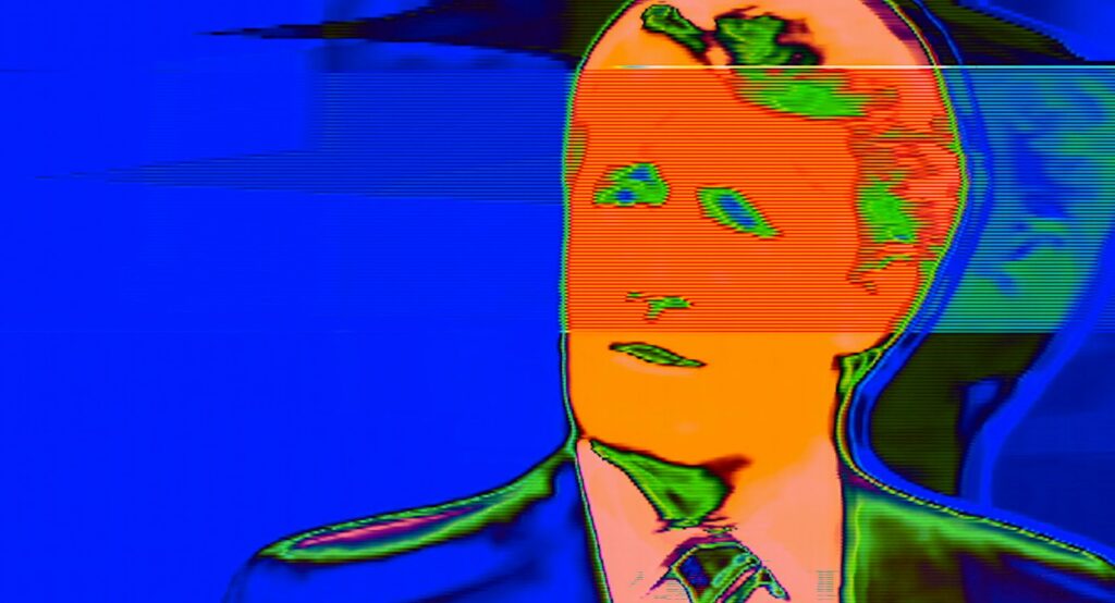 A fuzzy TV image in blue and orange negative shows Brian Mulroney giving an interview.
