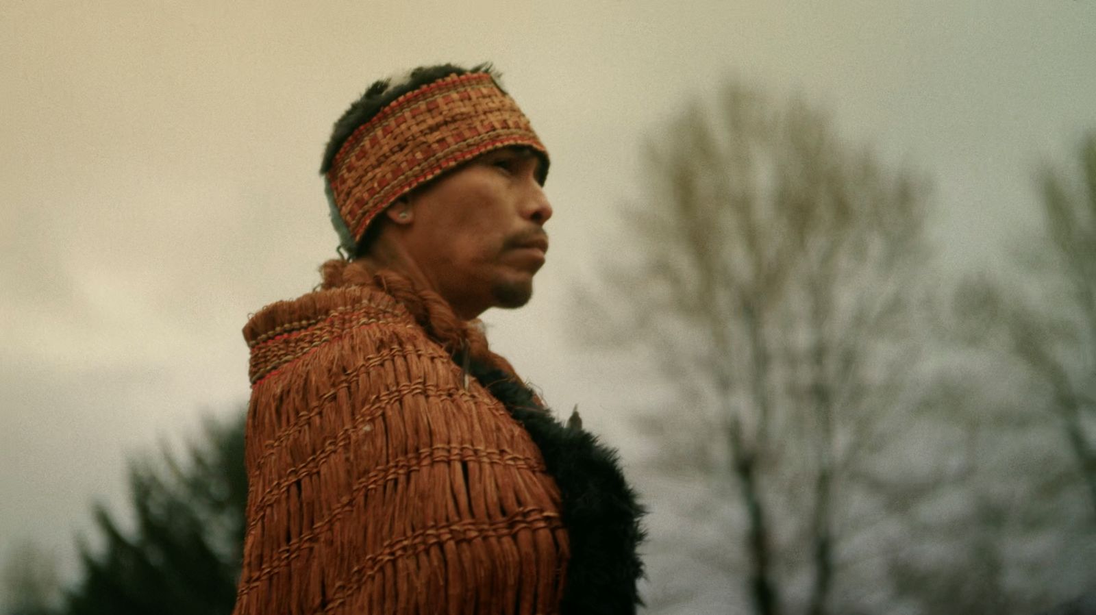 Nannika, representing the alhukwala (medicine person), stands during the sputc ceremony in Bella Coola Valley. The ceremony marks a return to ancestral practice after the collapse of the ooligan run.